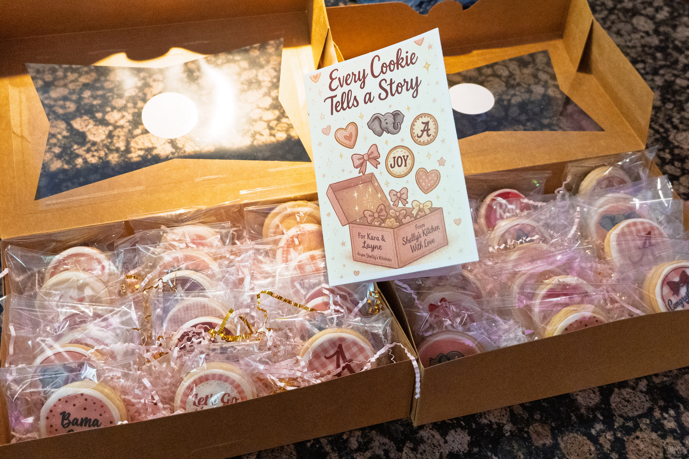 Gift boxes filled with individually wrapped custom sugar cookies and an Every Cookie Tells a Story card